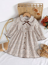 Young Girl Countryside Ditsy Floral Dress With Peter Pan Collar, Regular Shoulder, Puff Sleeves And A-Line Waist